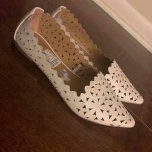 Woman’s white flats 10